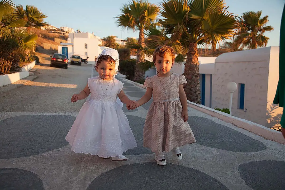 Mykonos seaside taverna baptism portrait in Greece
