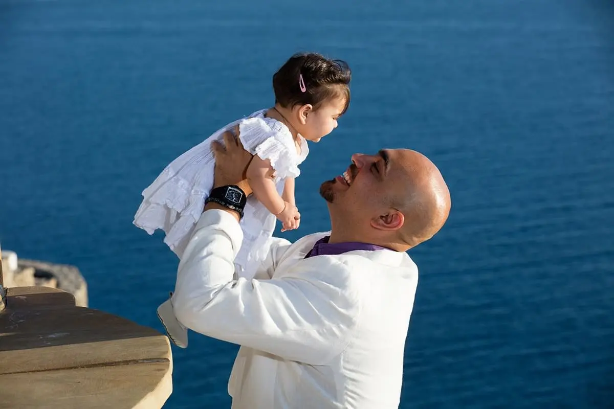 Soft seaside family portrait in Mykonos, Greece