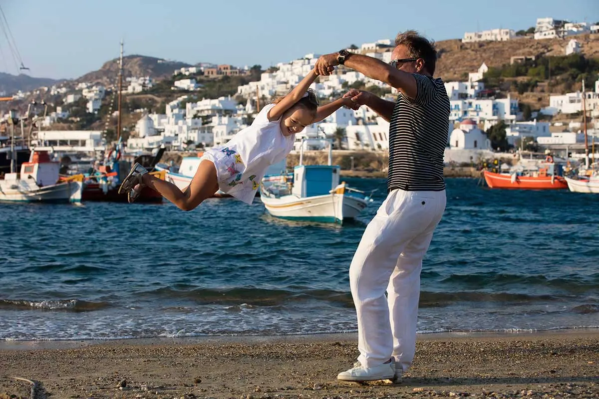 Cousins playful portrait in Mykonos, Greece