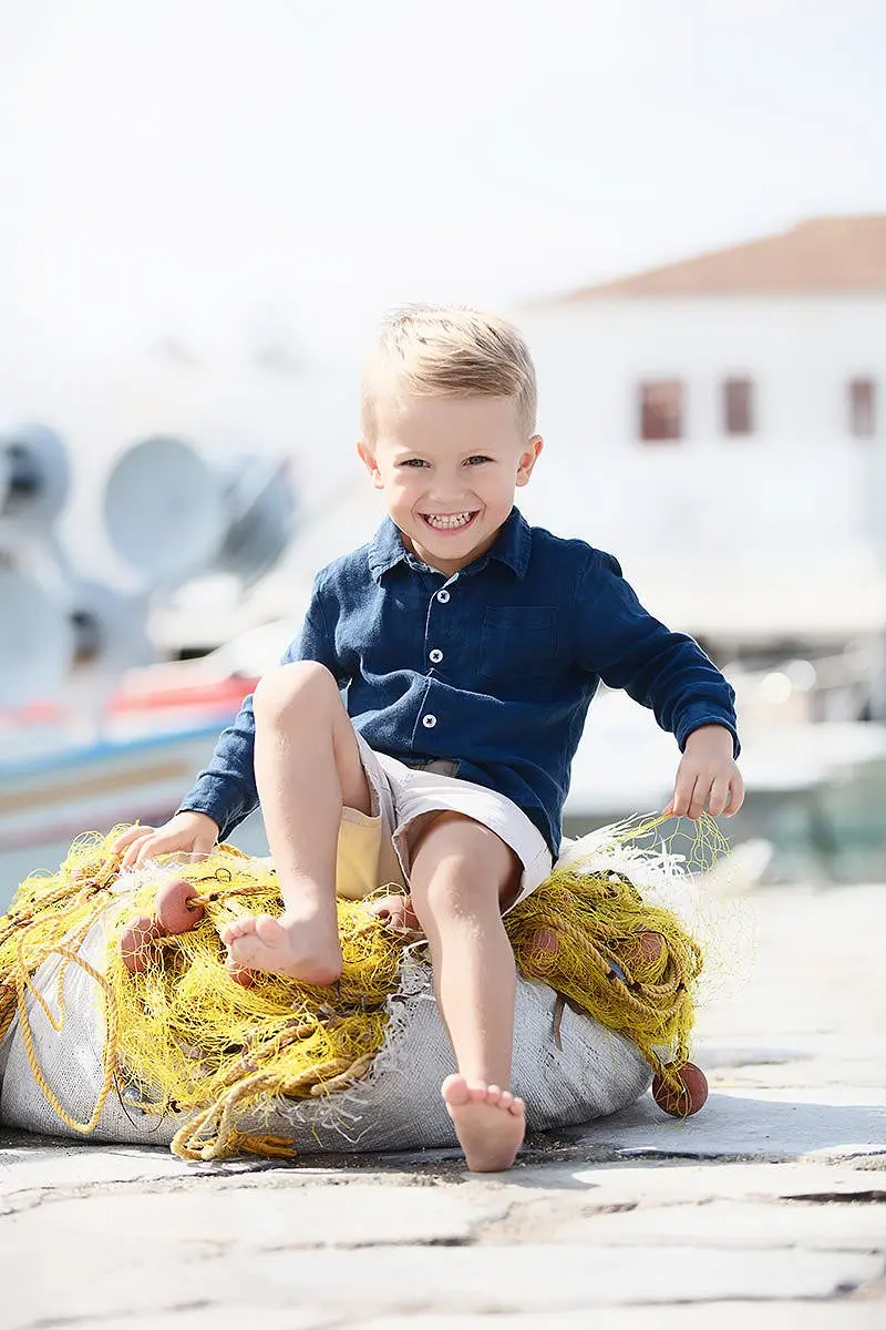 Summer poolside children portrait in Mykonos, Greece