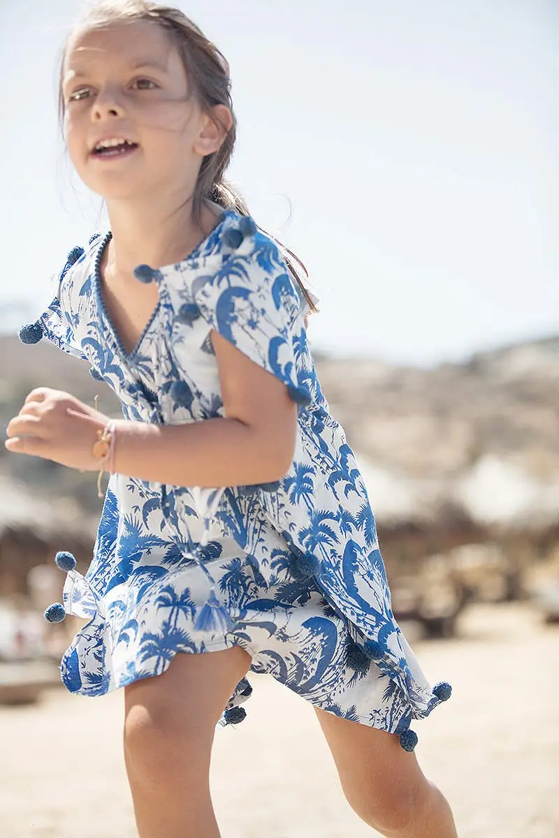 Coastal poolside children portrait in Mykonos, Greece