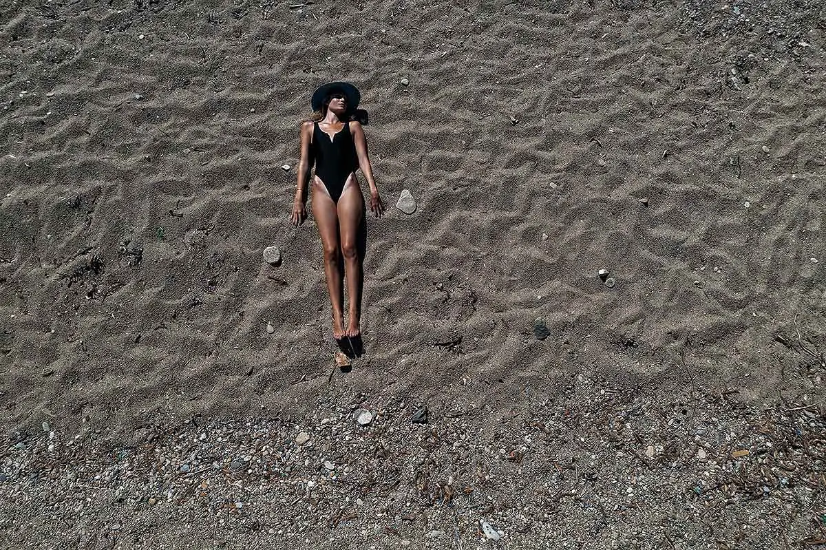Top-down drone portrait on sand in Mykonos, Greece