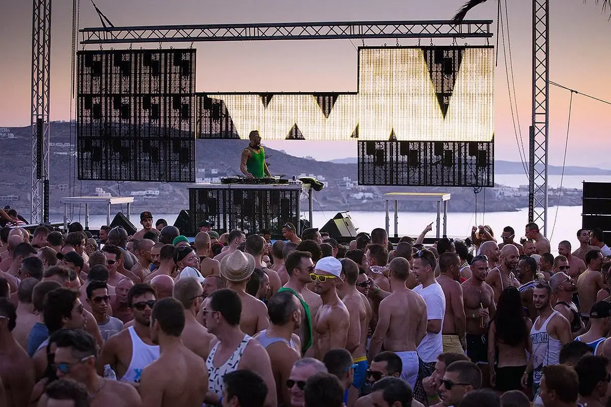 Sunlit summer festival event frame in Mykonos, Greece