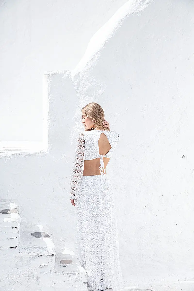 Designer monogram body paint conceptual fashion editorial in Mykonos, Greece