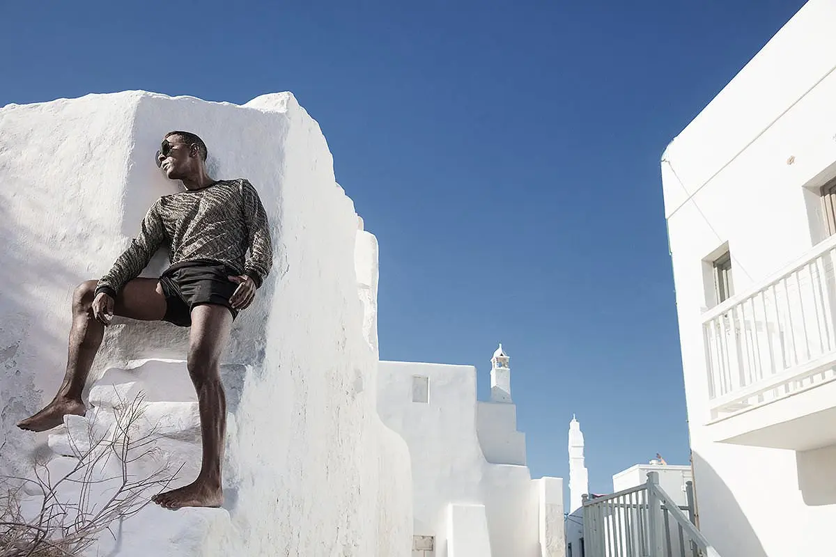 Knitwear under sun menswear fashion editorial in Mykonos, Greece