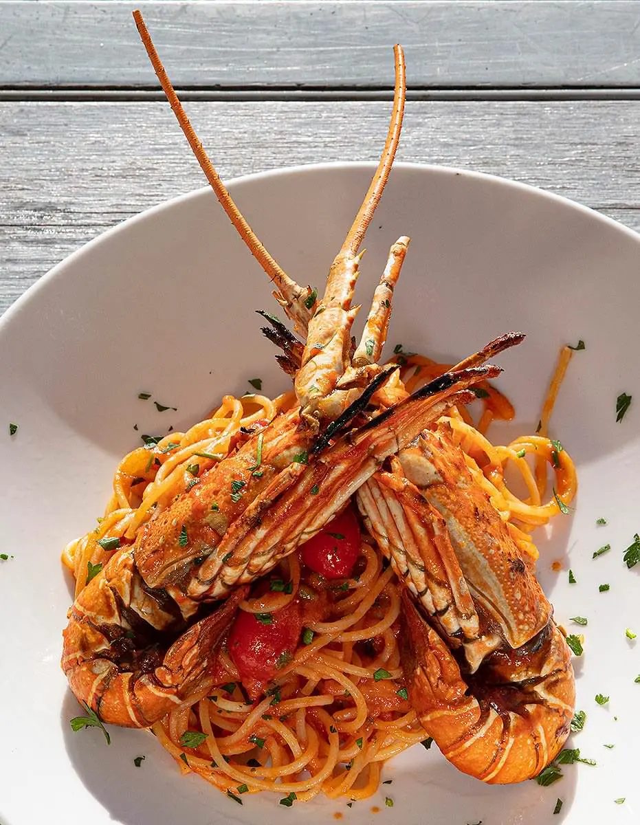 Lobster spaghetti in tomato sauce, Mediterranean food photography in Mykonos, Greece