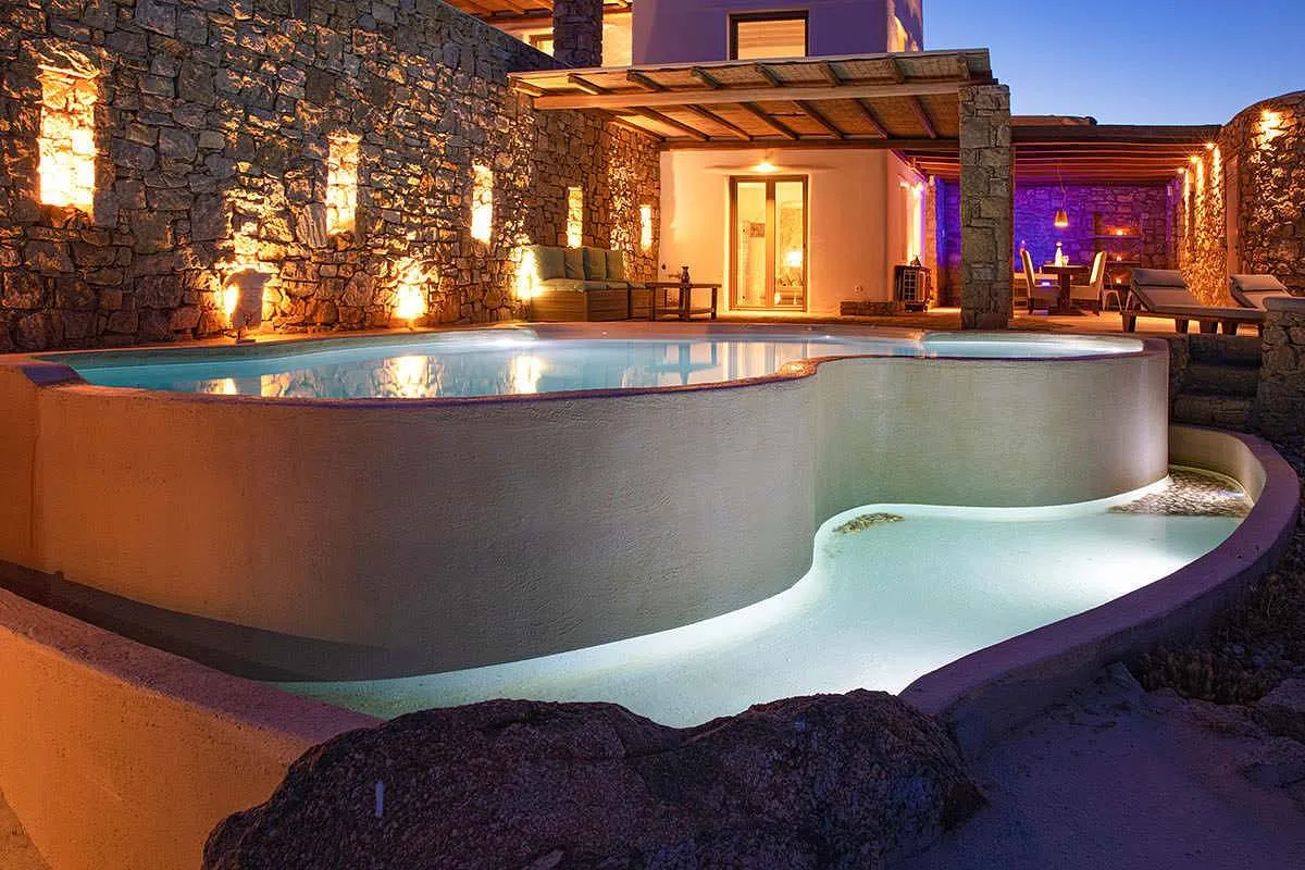 Sunlit beachfront hotels villas advertising outtake in Mykonos, Greece