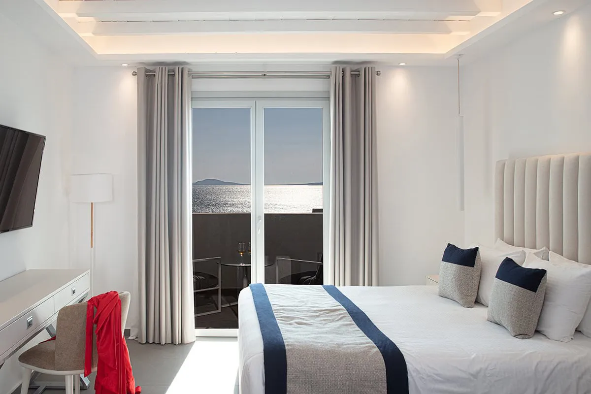 Sunlit Cycladic villa hotels villas advertising view in Mykonos, Greece