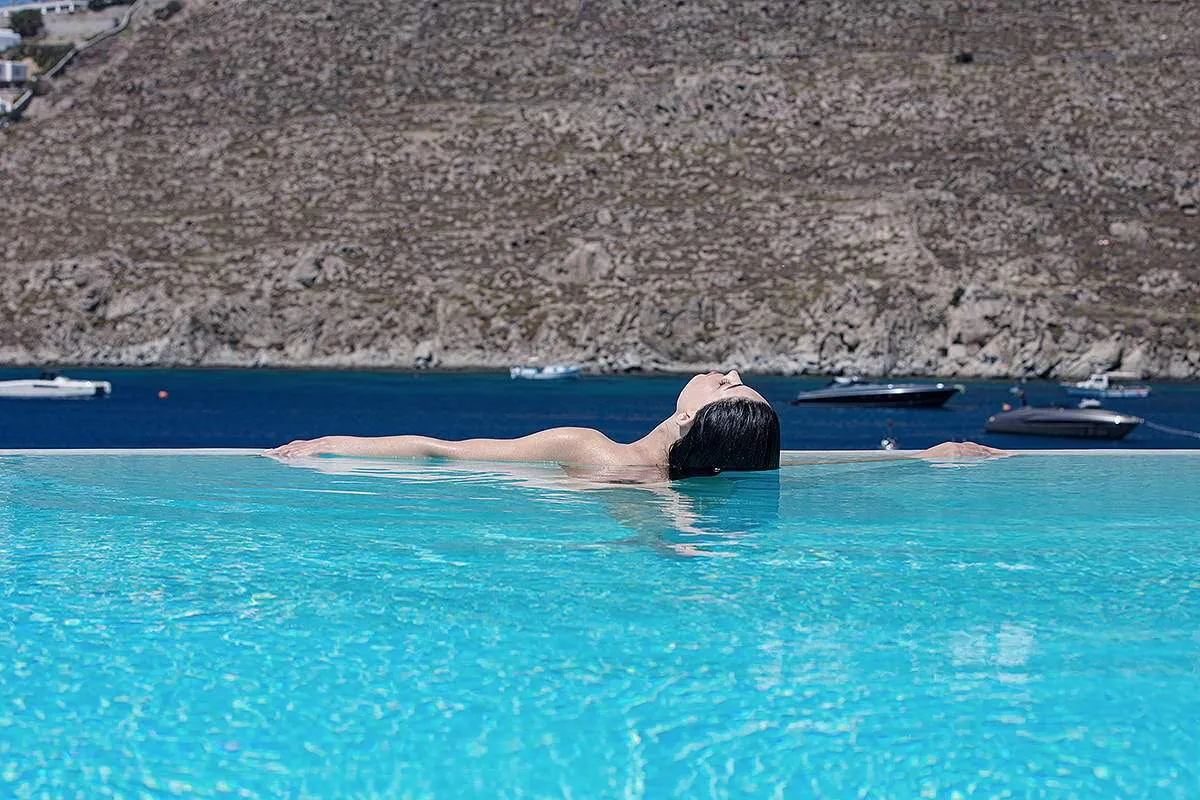 Sunlit Cycladic villa hotels villas advertising moment in Mykonos, Greece