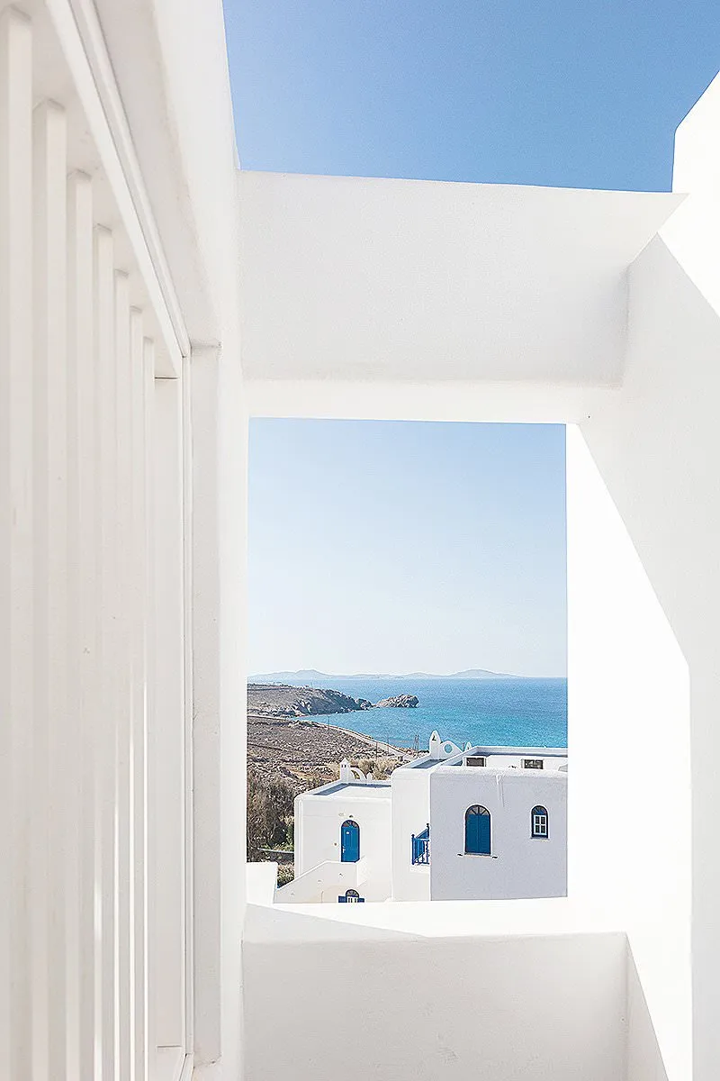 Sunlit Cycladic villa hotels villas advertising composition in Mykonos, Greece