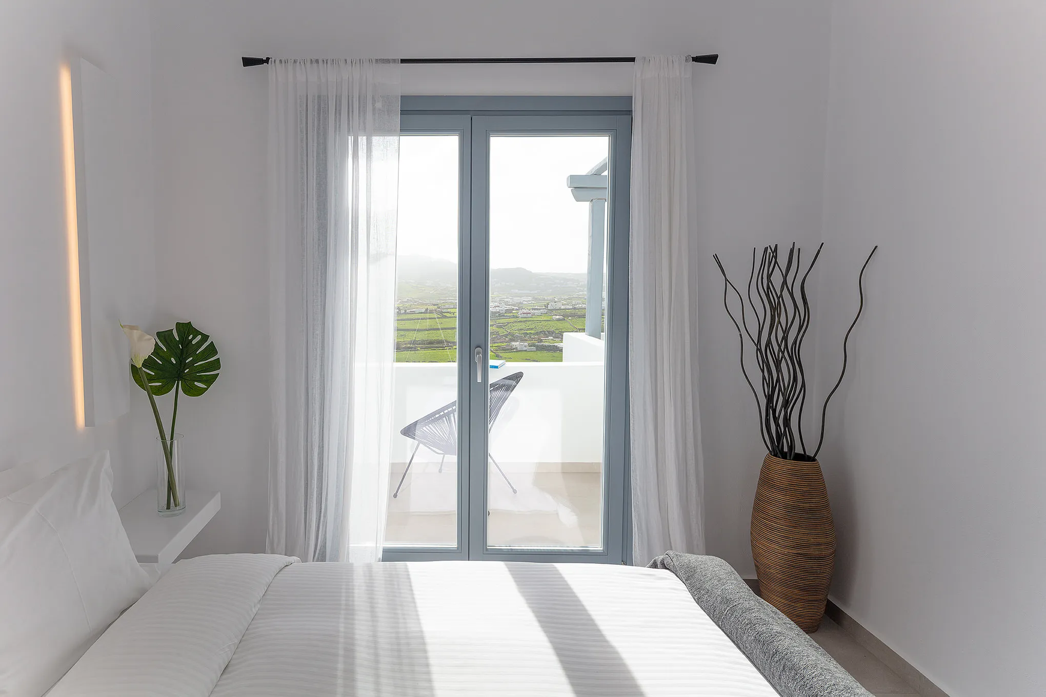 Sunlit designer villa hotels villas advertising frame in Mykonos, Greece