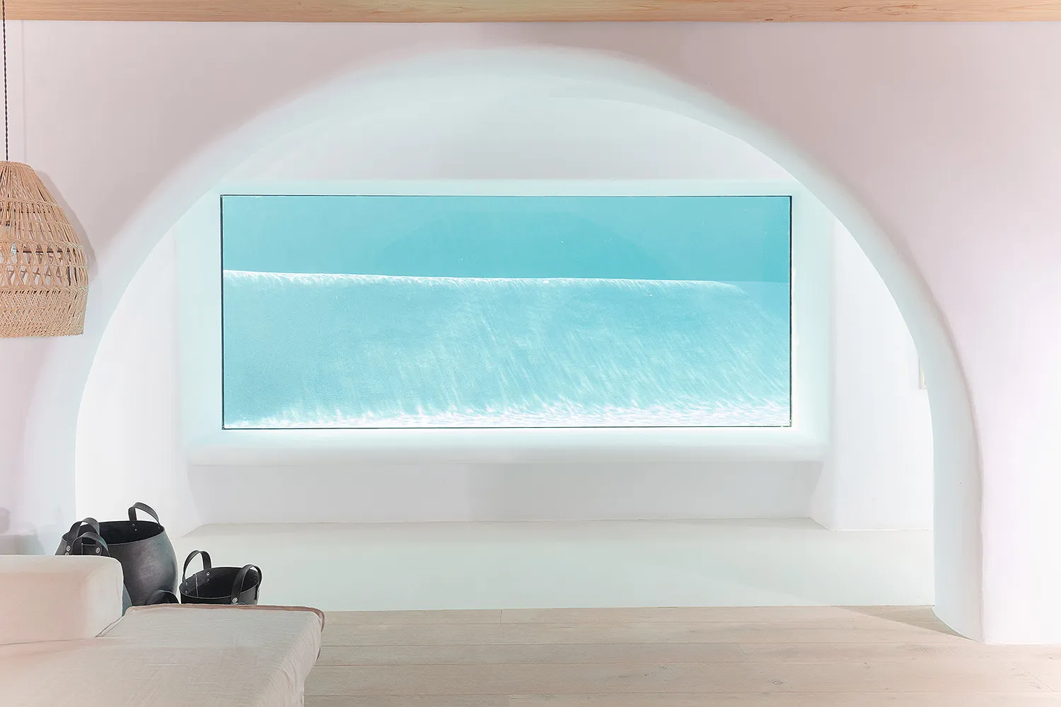 Sunlit infinity pool hotels villas advertising shot in Mykonos, Greece