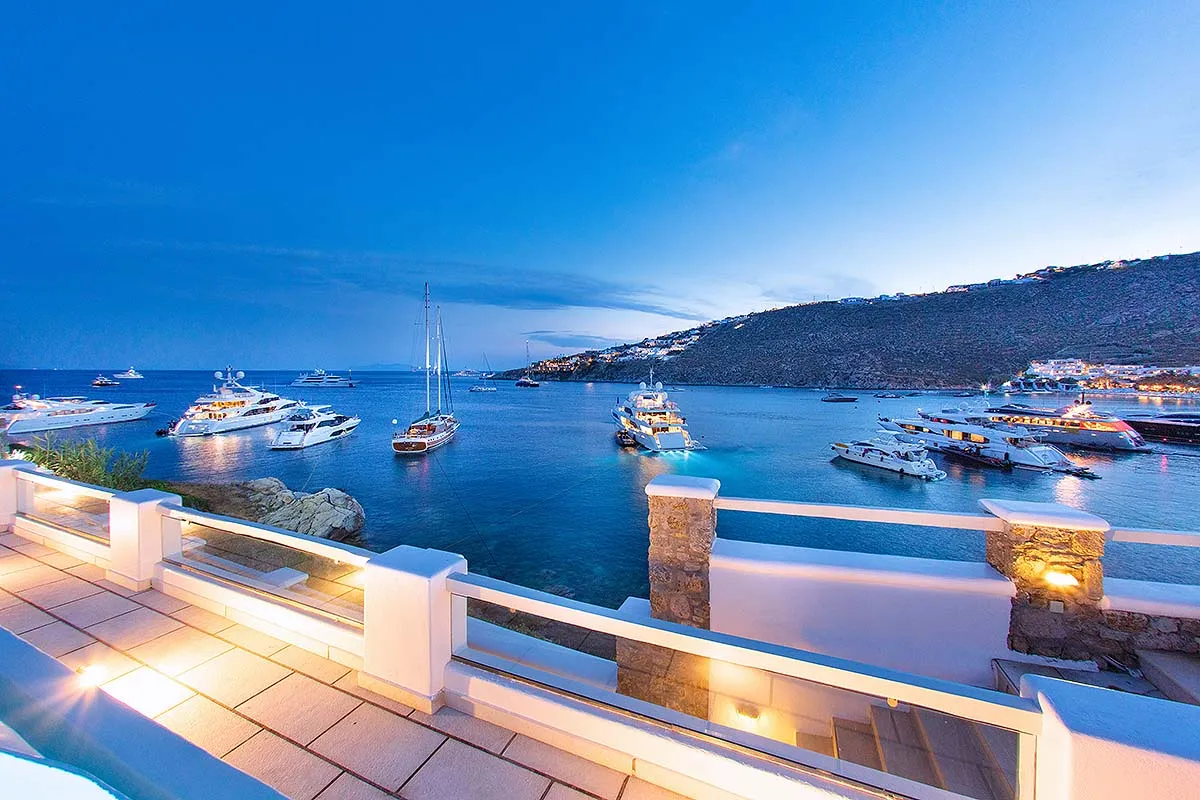 Sunlit lounge area hotels villas advertising view in Mykonos, Greece