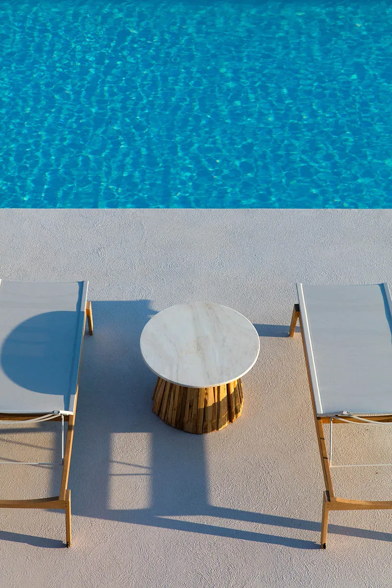 Sunlit lounge area hotels villas advertising study in Mykonos, Greece