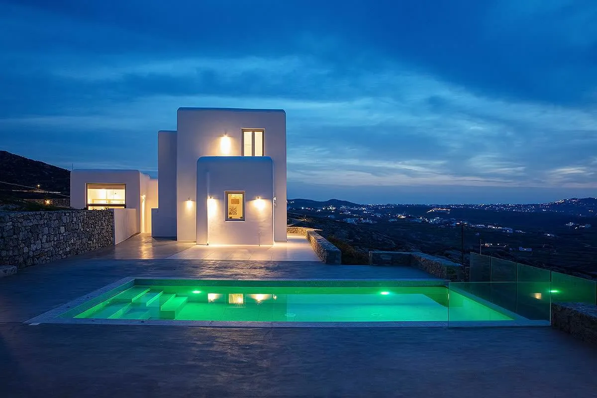 Sunlit minimalist room hotels villas advertising study in Mykonos, Greece