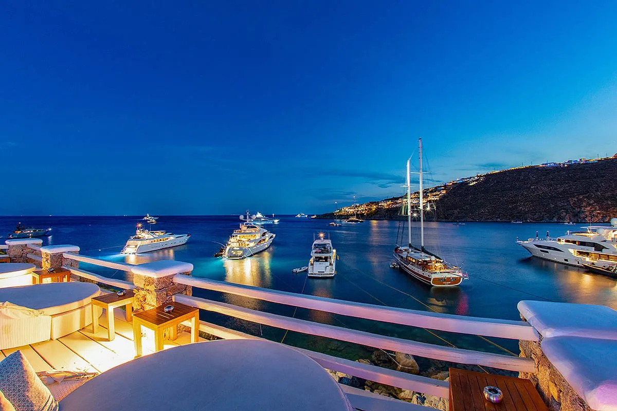 Sunlit minimalist room hotels villas advertising shot in Mykonos, Greece