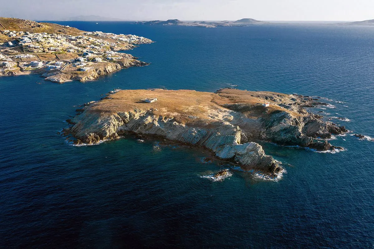 Sunlit open plan hotels villas advertising frame in Mykonos, Greece