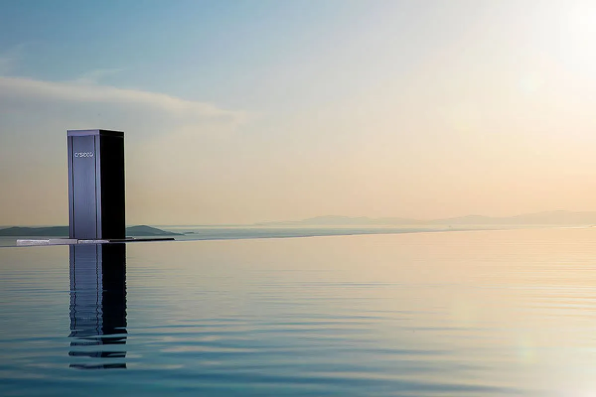 Sunlit private pool hotels villas advertising shot in Mykonos, Greece