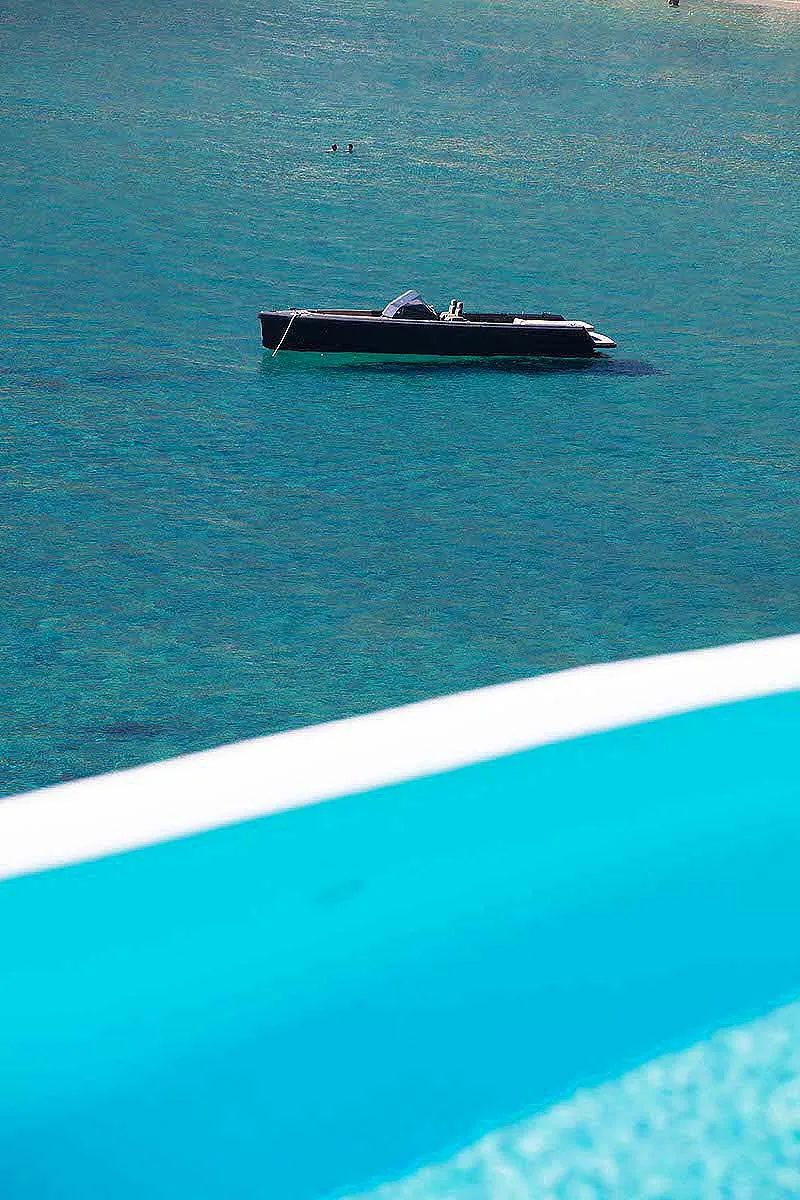 Sunlit private pool hotels villas advertising outtake in Mykonos, Greece