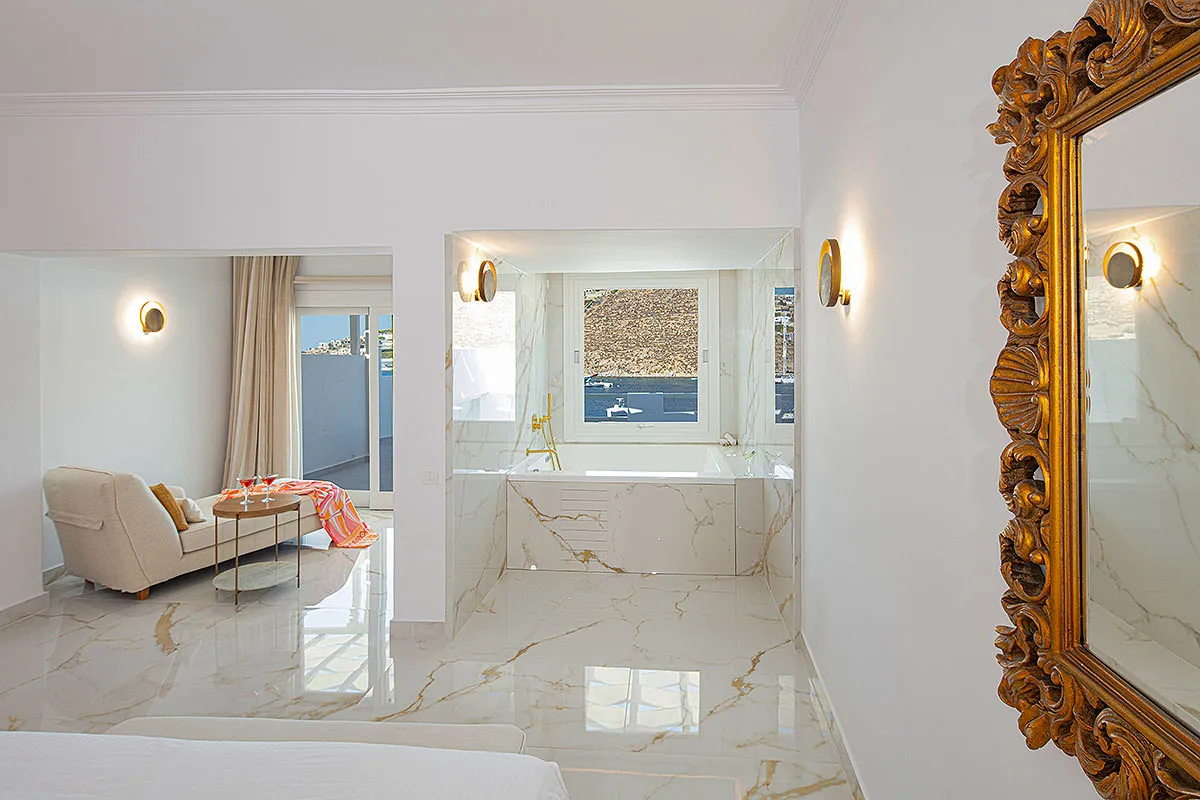 Sunlit stone lobby hotels villas advertising view in Mykonos, Greece