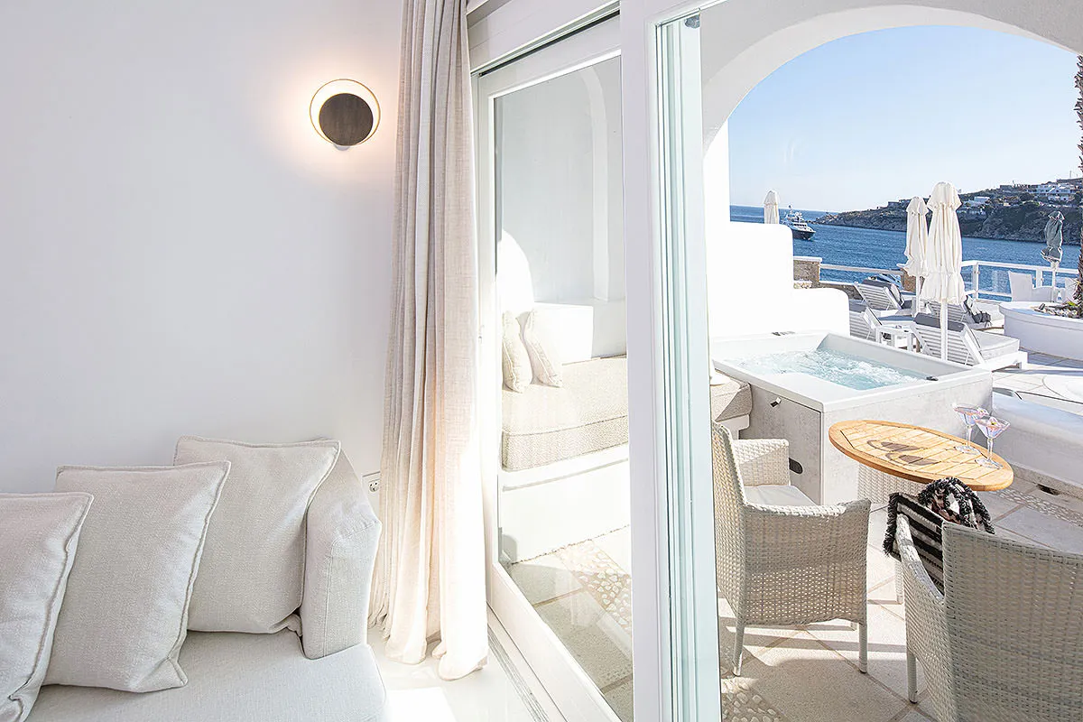 Sunlit stone lobby hotels villas advertising outtake in Mykonos, Greece