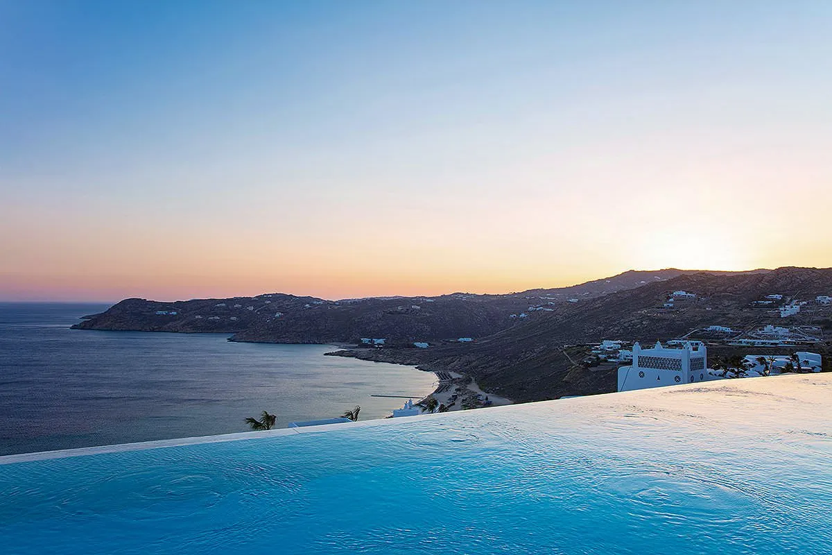 Sunlit yacht view hotels villas advertising study in Mykonos, Greece