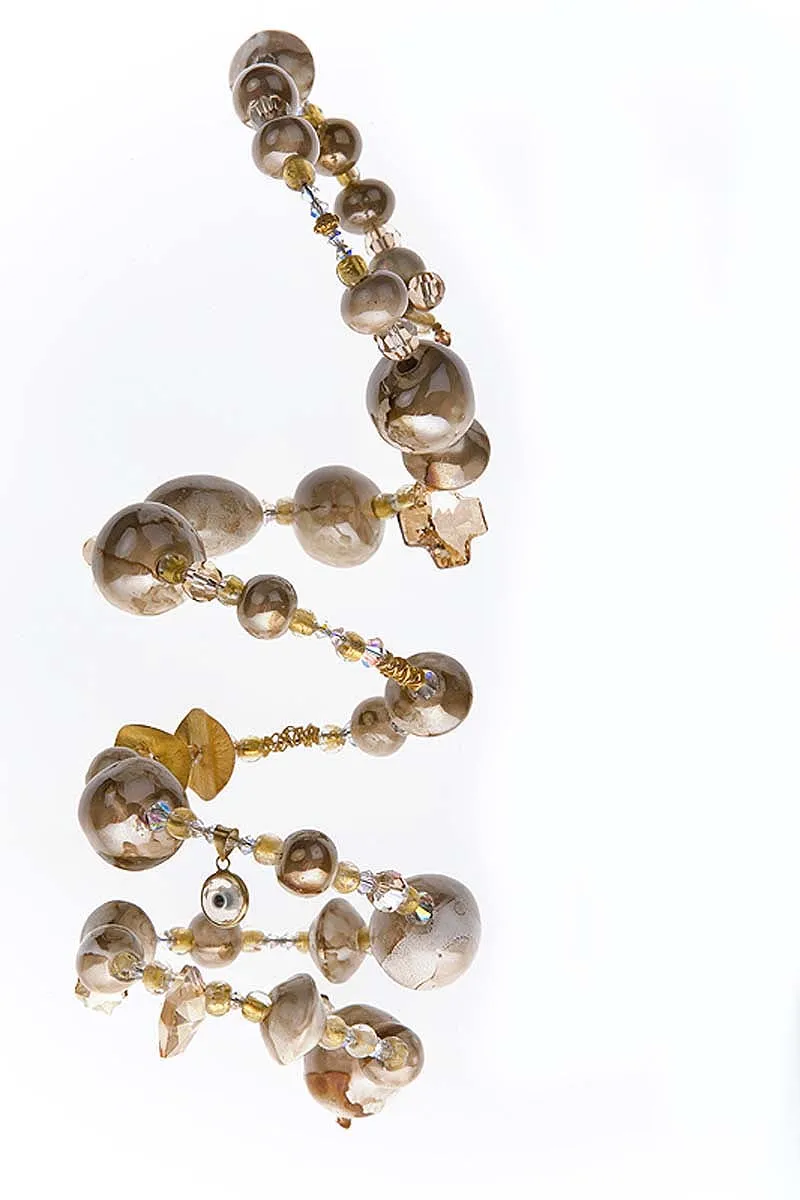Sunlit fine detail jewellery study in Mykonos, Greece