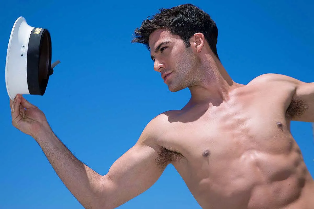 Soft-light aerial swimmer portrait study in Mykonos, Greece
