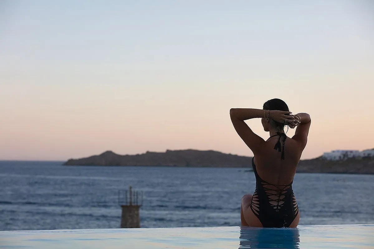 Soft-light bikini villa portrait moment in Mykonos, Greece