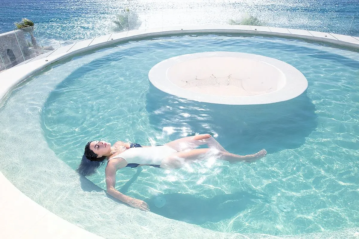 Soft-light bikini villa portrait shot in Mykonos, Greece