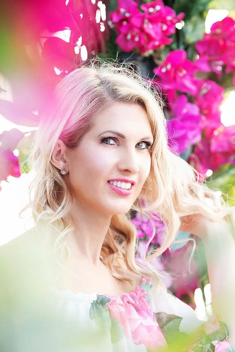 Soft-light bougainvillea Asian beauty portrait shot in Mykonos, Greece
