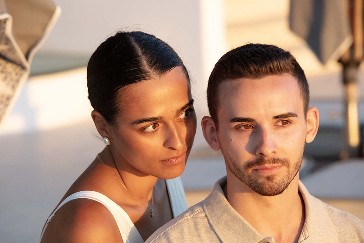 Soft-light engagement rooftop portrait study in Mykonos, Greece