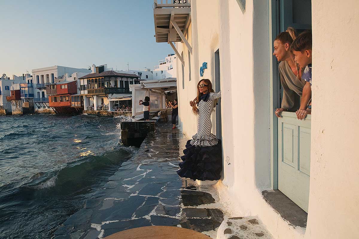 Soft-light engagement rooftop portrait composition in Mykonos, Greece