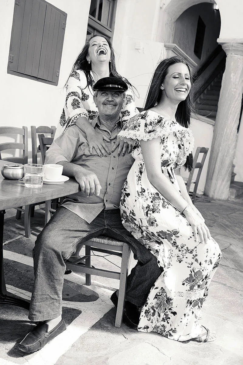 Soft-light family Cycladic monochrome portrait frame in Mykonos, Greece