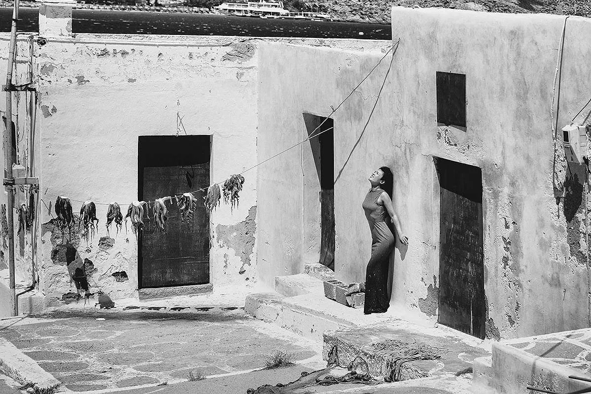 Soft-light family sunset jump portrait outtake in Mykonos, Greece