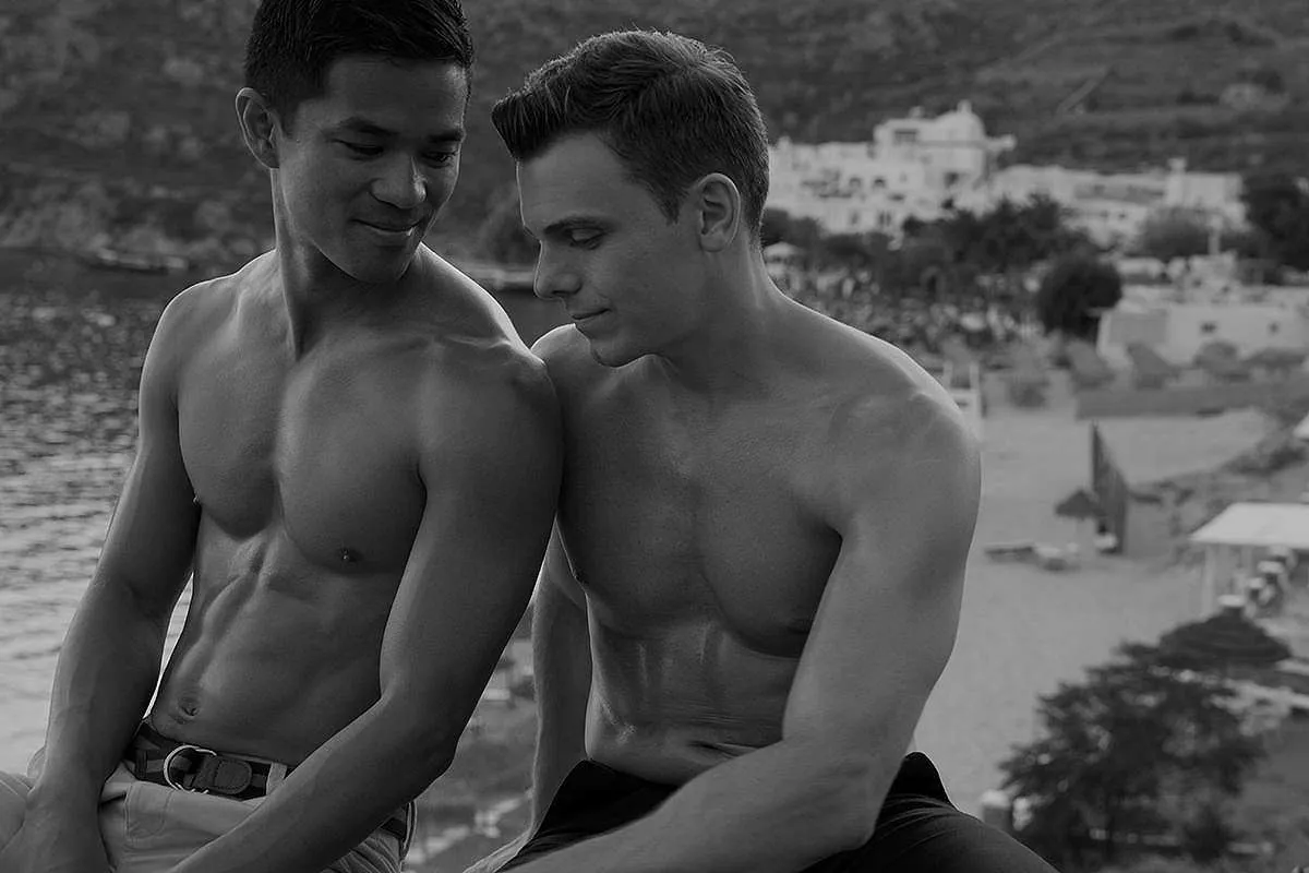 Soft-light monochrome male duo portrait frame in Mykonos, Greece