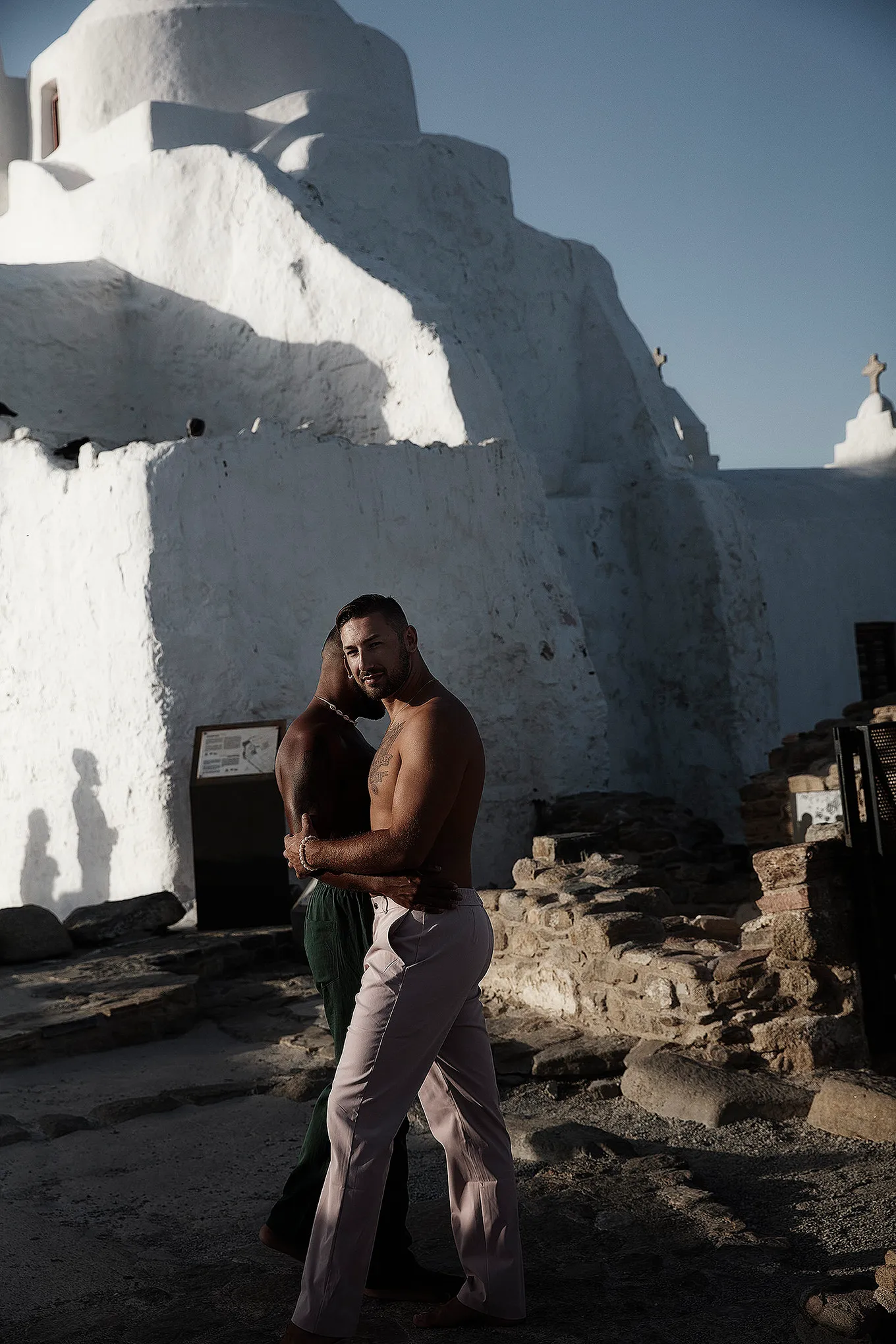 Soft-light schoolgirl editorial portrait composition in Mykonos, Greece