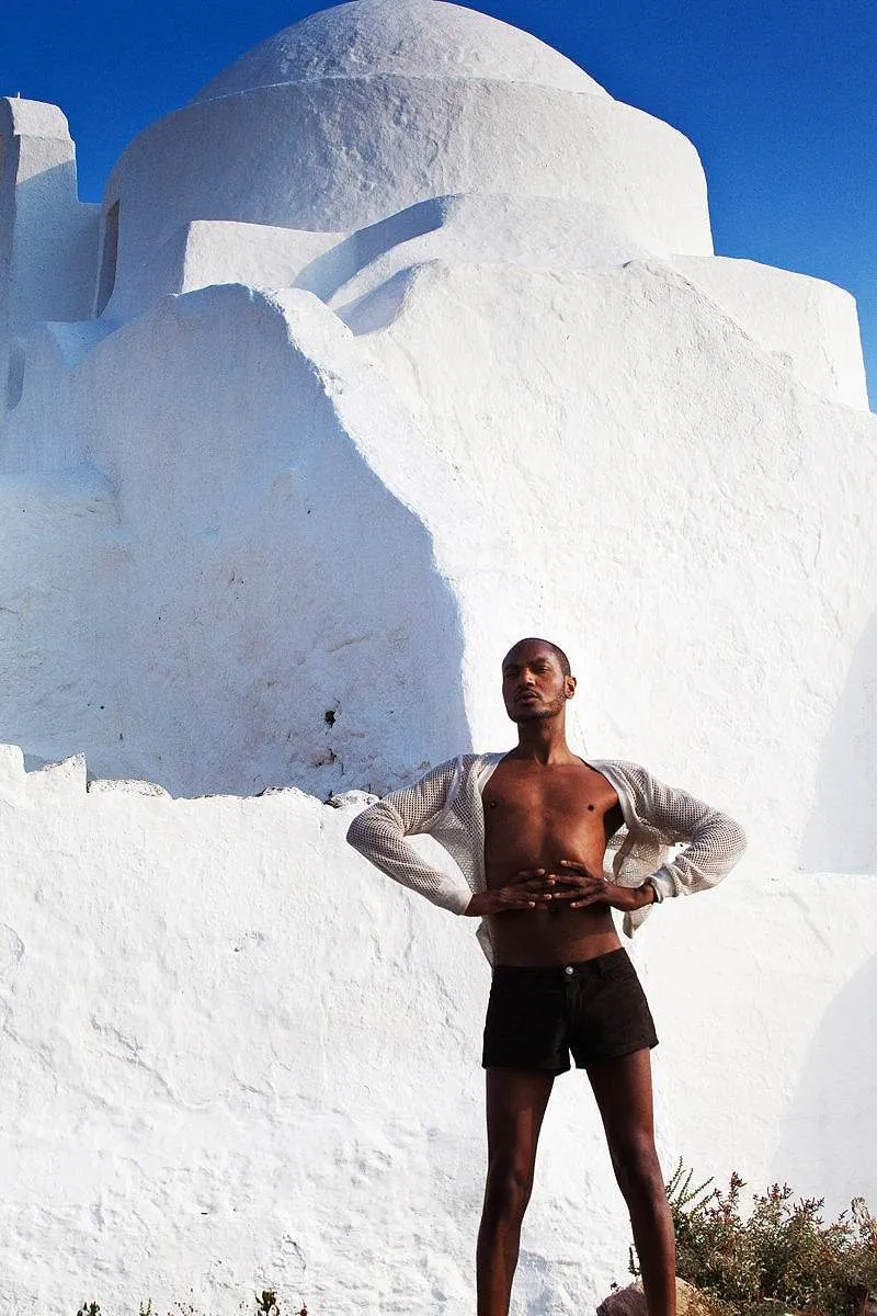 Soft-light wet male monochrome portrait study in Mykonos, Greece