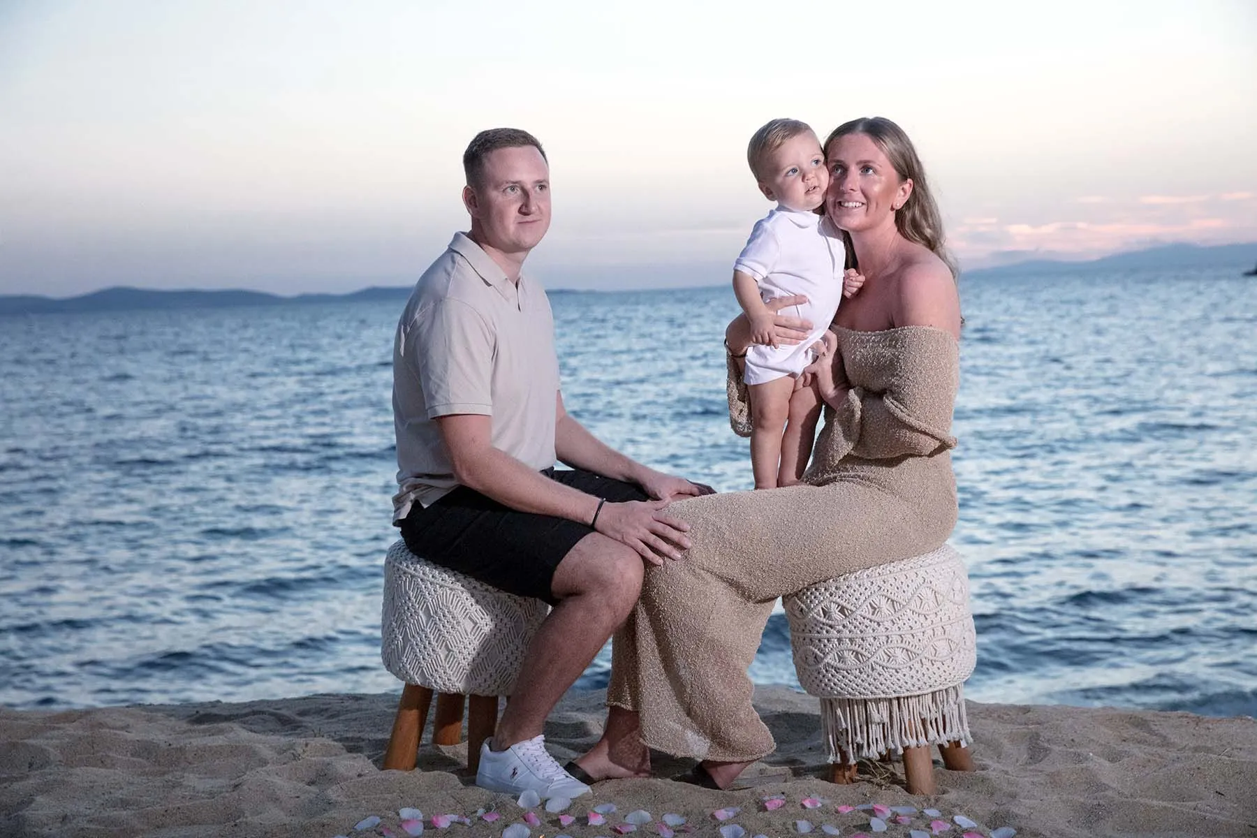 Sunlit rooftop wedding proposal frame in Mykonos, Greece