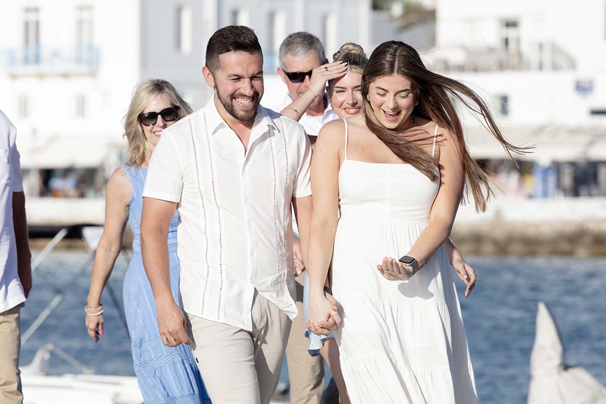 Sunlit rooftop wedding proposal view in Mykonos, Greece
