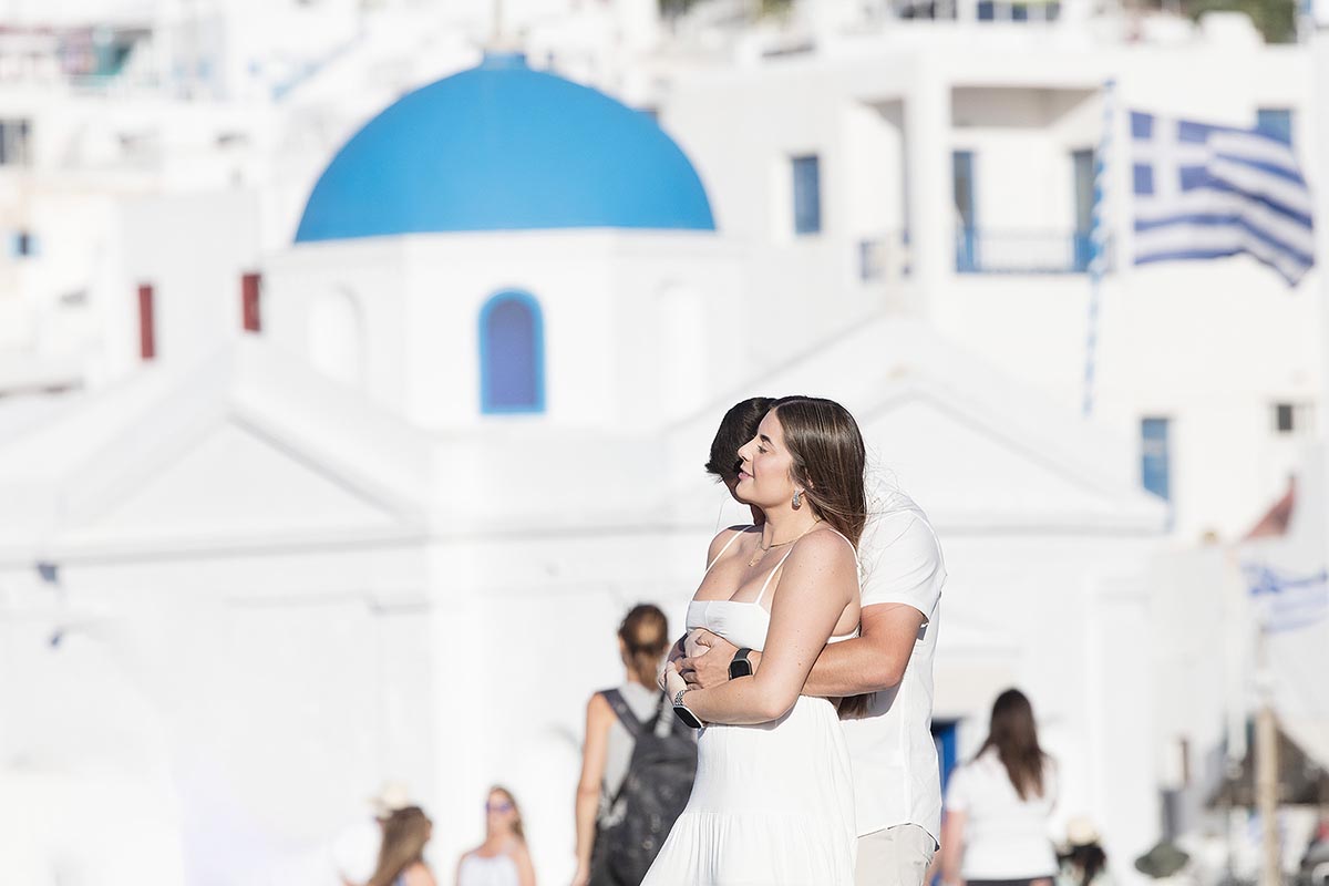 Sunlit rooftop wedding proposal study in Mykonos, Greece