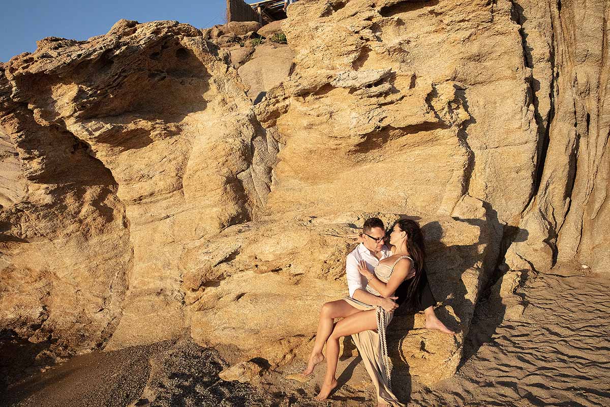 Sunlit sunset view wedding proposal moment in Mykonos, Greece