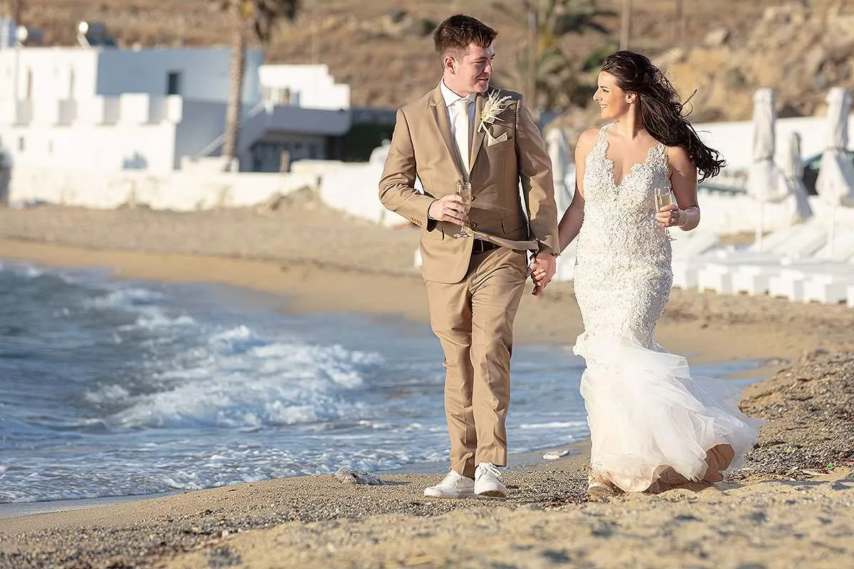 Sunlit beach wedding photography at a Mykonos villa, in Mykonos, Greece