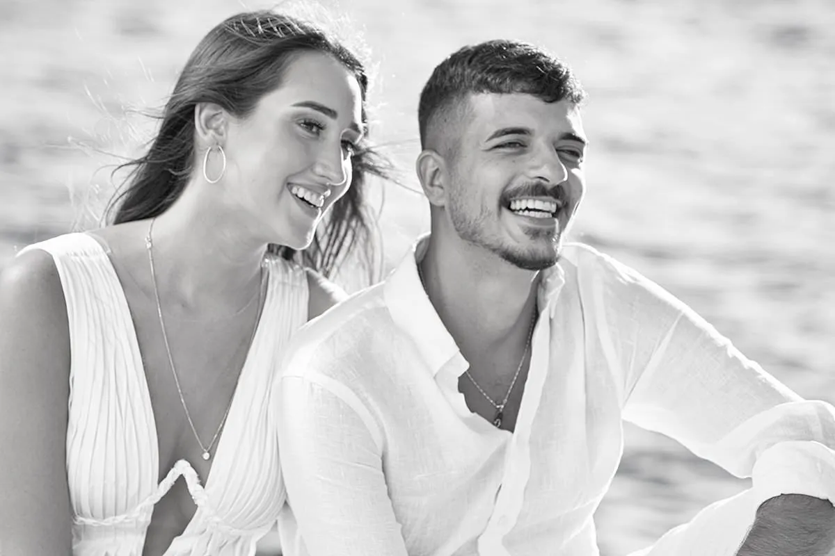 Sunlit beach wedding photography by the Aegean sea, in Mykonos, Greece