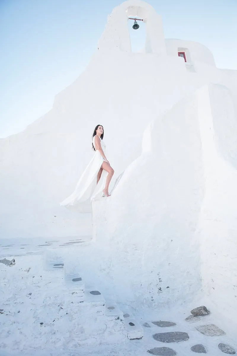 Sunlit beach wedding photography on a Cycladic terrace, in Mykonos, Greece