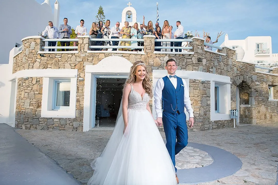 Sunlit blue dome chapel wedding photography at a Mykonos villa, in Mykonos, Greece
