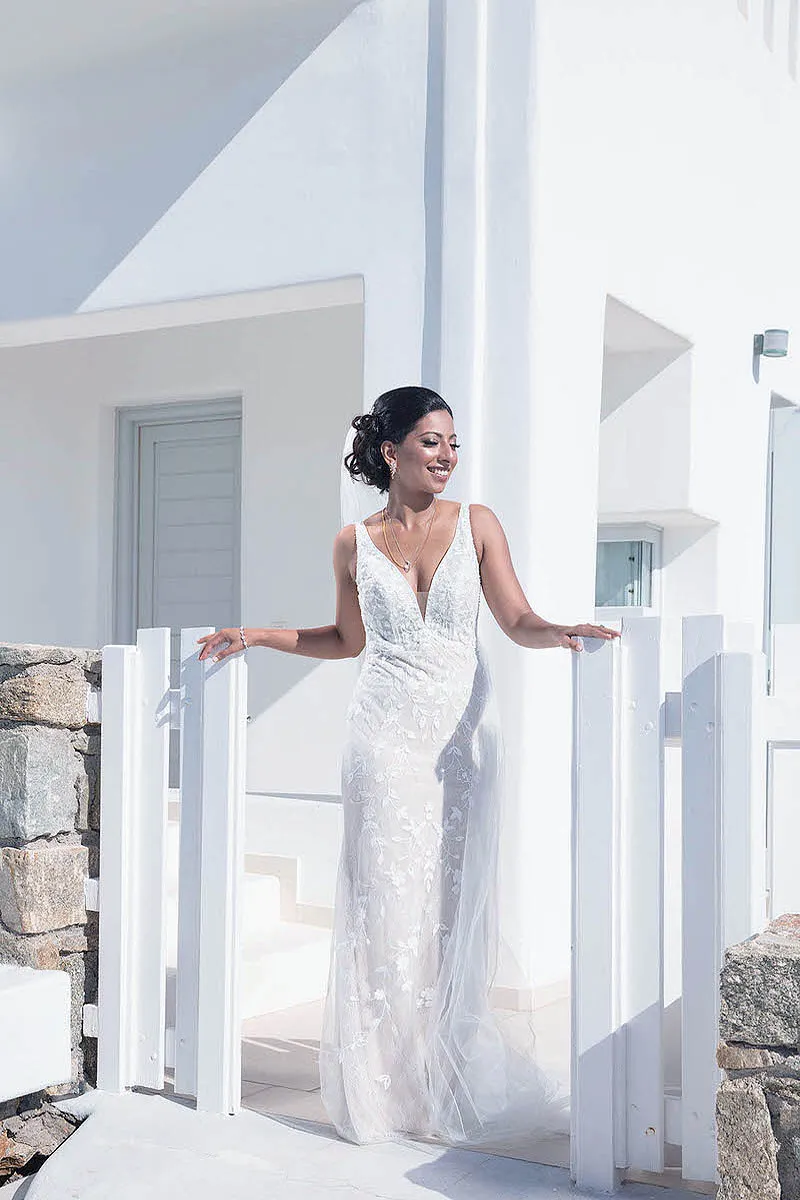 Sunlit blue dome chapel wedding photography at a whitewashed chapel, in Mykonos, Greece