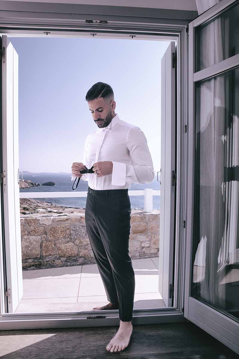 Sunlit bridal glow wedding photography by the Aegean sea, in Mykonos, Greece