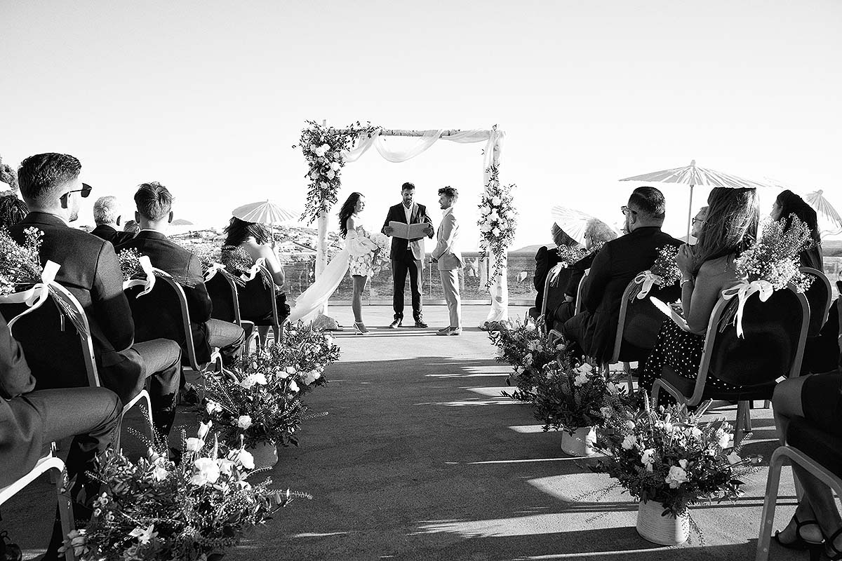 Sunlit bridal glow wedding photography in a Mykonos courtyard, in Mykonos, Greece