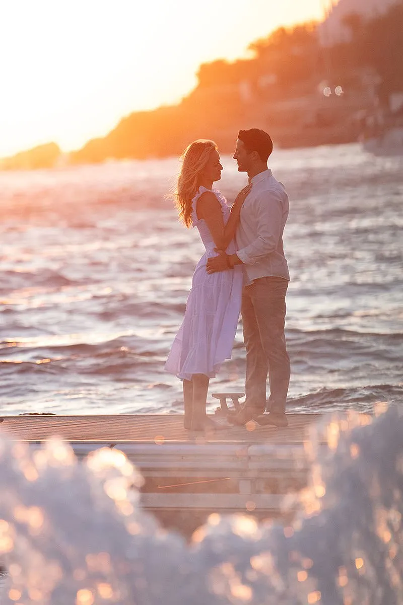 Sunlit bride portrait wedding photography at a whitewashed chapel, in Mykonos, Greece